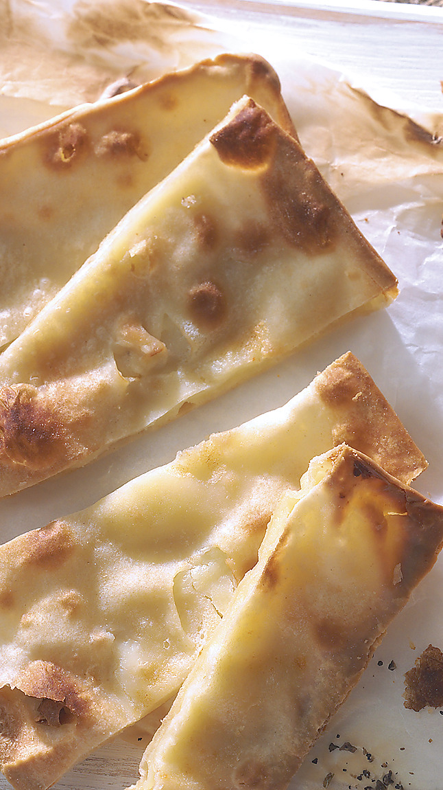 Focaccia_ligure_con_stracchino_detail_65078 Focaccia_ligure_con_stracchino_detail_65078